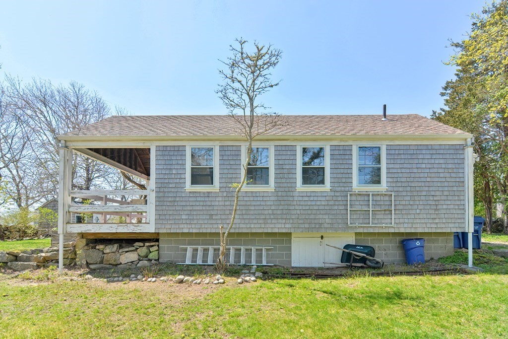 1904 Main Road Westport, MA 02791 - Photo 35 of 42 a front view of a house with a yard