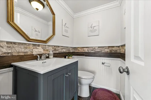 a bathroom with a sink and a toilet