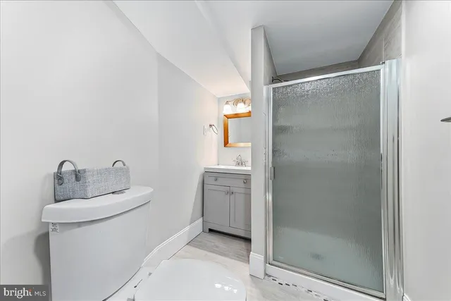 a view of storage and utility room with washer and dryer