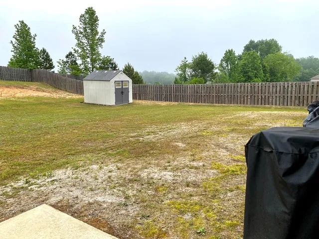 a view of a swimming pool with an outdoor space
