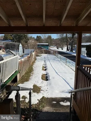 a view of a balcony with chairs