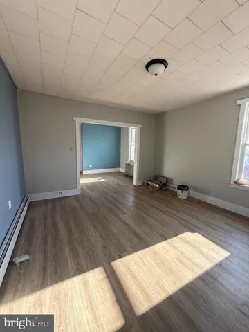 a view of an empty room and window