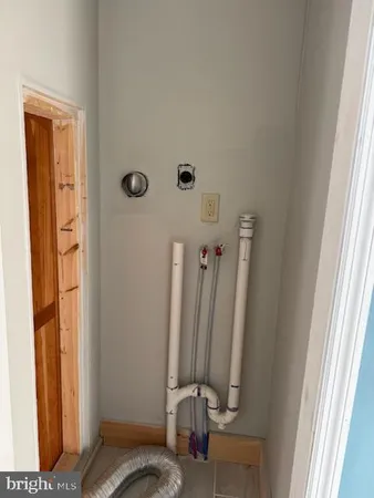 a view of a closet with storage