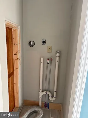 a view of a closet with storage