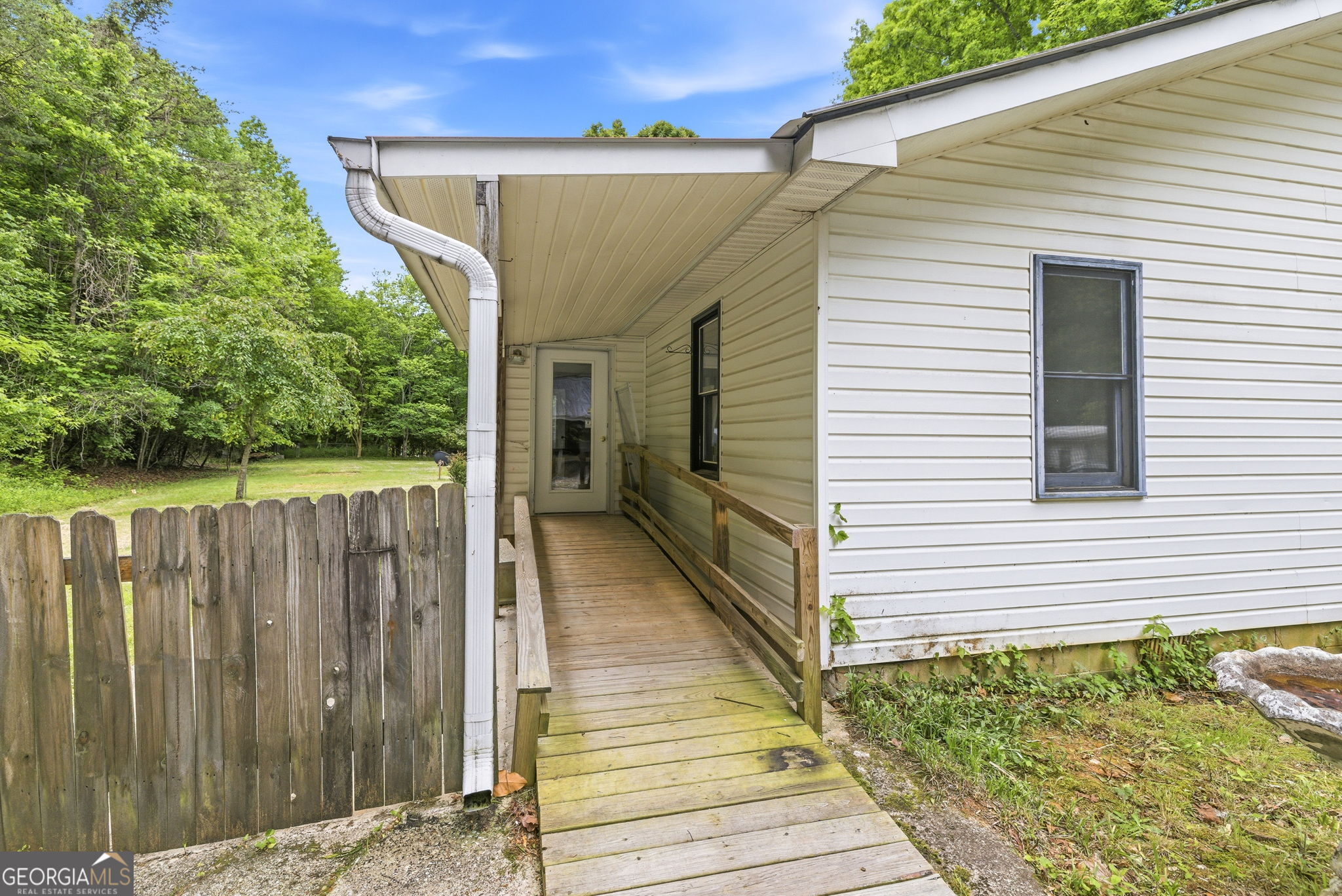 210 Kentucky Street Demorest, GA 30535 - Photo 26 of 30 a view of a house with wooden fence