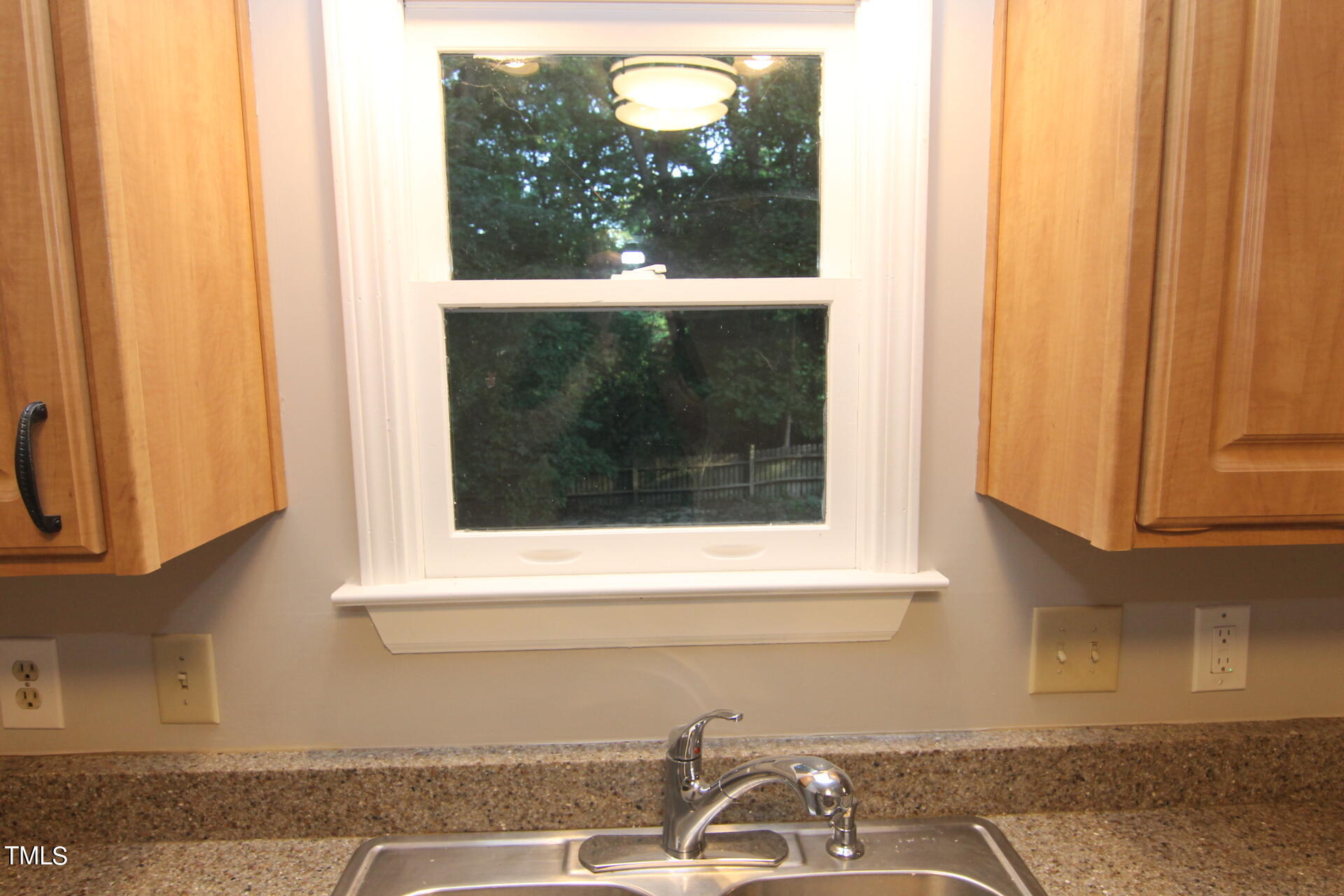3313 Singleleaf Lane Raleigh, NC 27616 - Photo 10 of 25 Kitchen window view to back yard