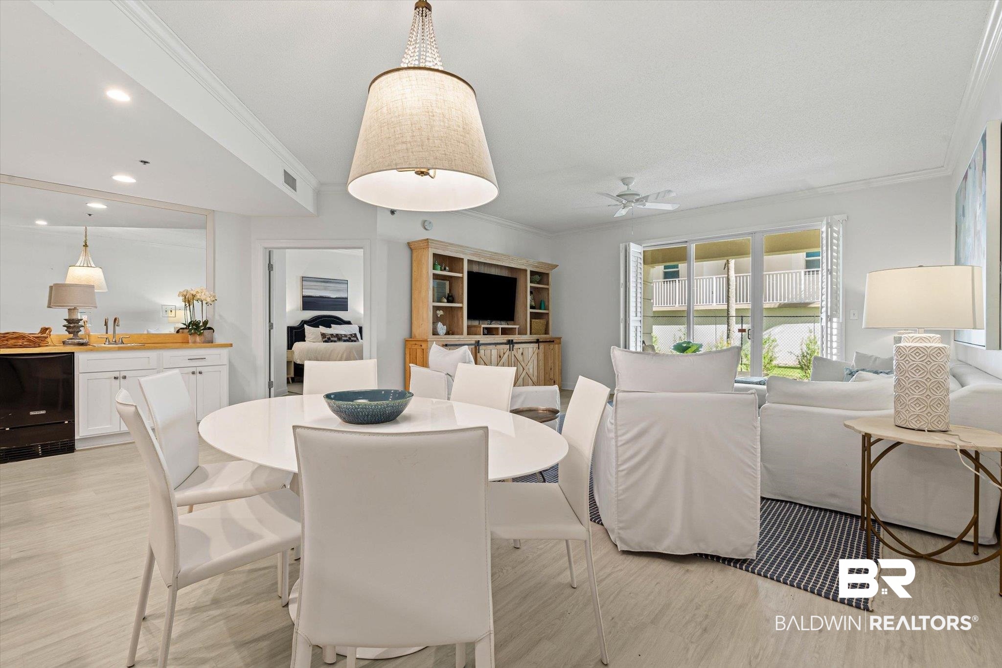 27770 Canal Road, Unit 2102 Orange Beach, AL 36561 - Photo 3 of 19 Dining area featuring light wood-style flooring, ornamental molding, a ceiling fan, and recessed lighting