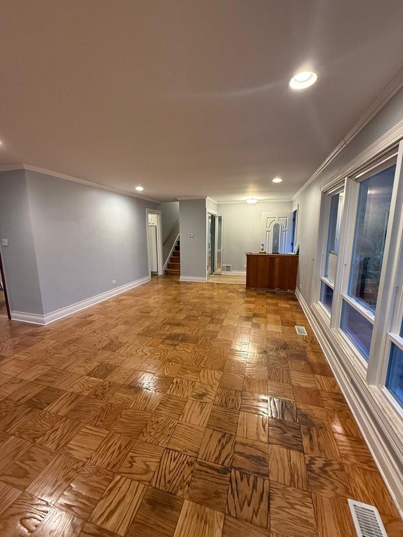 1440 Gentry Road Hoffman Estates, IL 60169 - Photo 5 of 15 a view of a large room