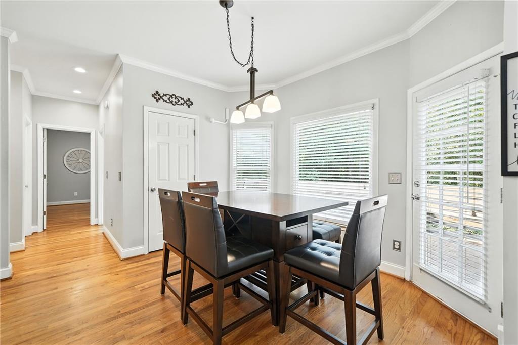 629 Gold Valley Pass Canton, GA 30114 - Photo 18 of 110 a dining room with furniture and window