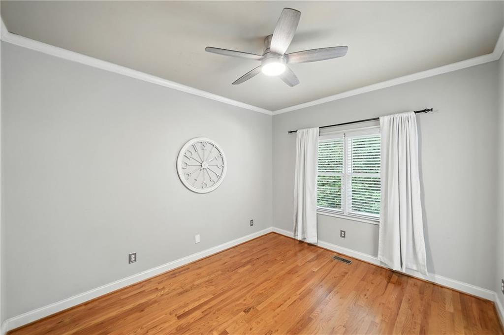 629 Gold Valley Pass Canton, GA 30114 - Photo 19 of 110 a view of a room with wooden floor and windows