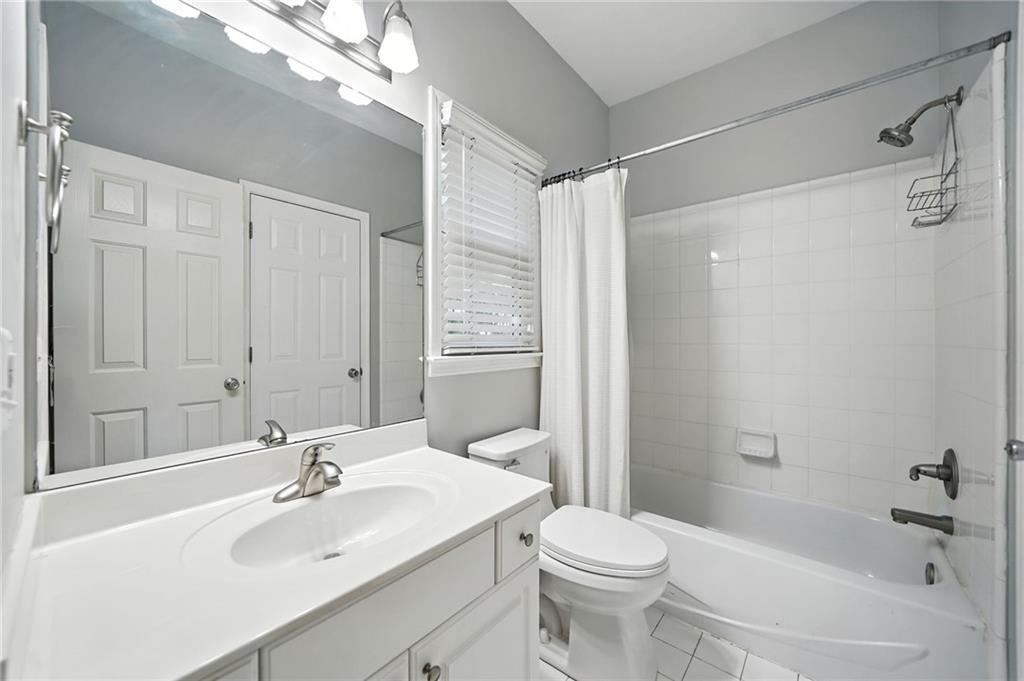 629 Gold Valley Pass Canton, GA 30114 - Photo 21 of 110 a bathroom with a sink toilet tub and shower