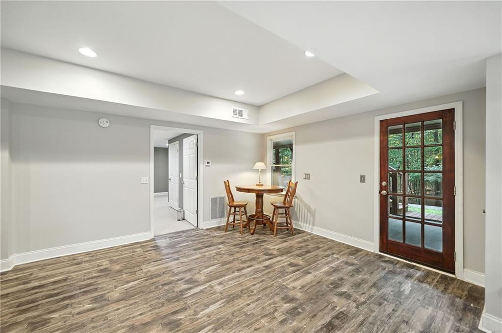 629 Gold Valley Pass Canton, GA 30114 - Photo 41 of 110 a view of a livingroom with furniture and wooden floor