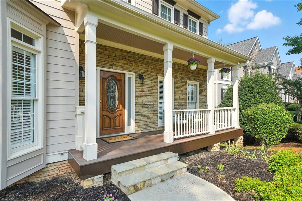 629 Gold Valley Pass Canton, GA 30114 - Photo 63 of 110 a front view of a house with a yard