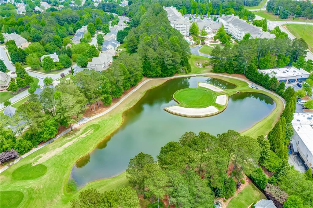 629 Gold Valley Pass Canton, GA 30114 - Photo 86 of 110 a view of a swimming pool with a yard