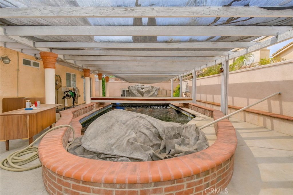 390 Dylan Circle Corona, CA 92879 - Photo 8 of 8 a view of a swimming pool in the back of house