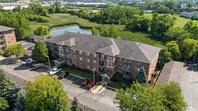 an aerial view of a house with a garden