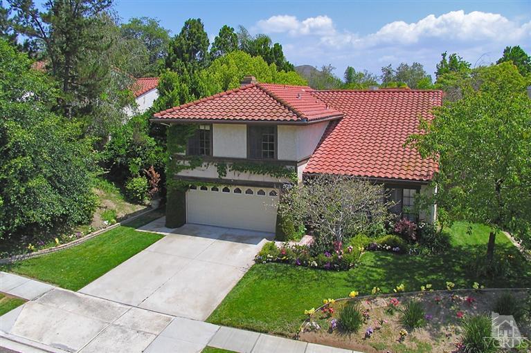 540 Fresh Meadows Road Simi Valley, CA 93065 - Photo 1 of 32 a front view of a house with a yard