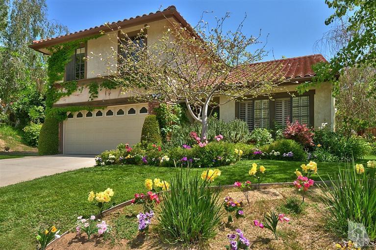 540 Fresh Meadows Road Simi Valley, CA 93065 - Photo 17 of 32 a front view of a house with a yard