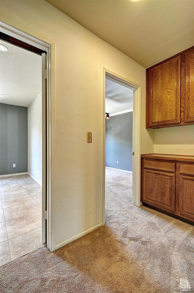 540 Fresh Meadows Road Simi Valley, CA 93065 - Photo 22 of 32 a view of a hallway to rooms