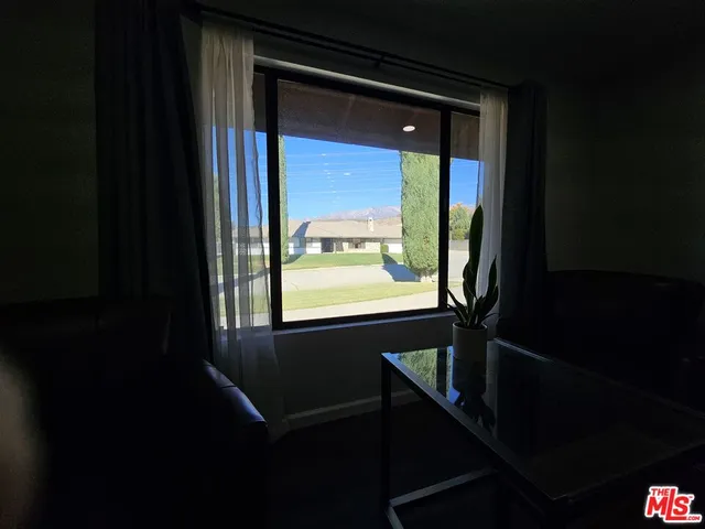 a kitchen with a table and chairs in it