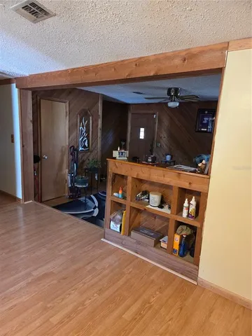 a view of a room with furniture and closet