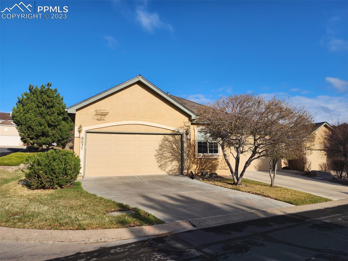 5671 Sonnet Ridge Point Colorado Springs, CO 80918 - Photo 1 of 30 Garage entrance to house