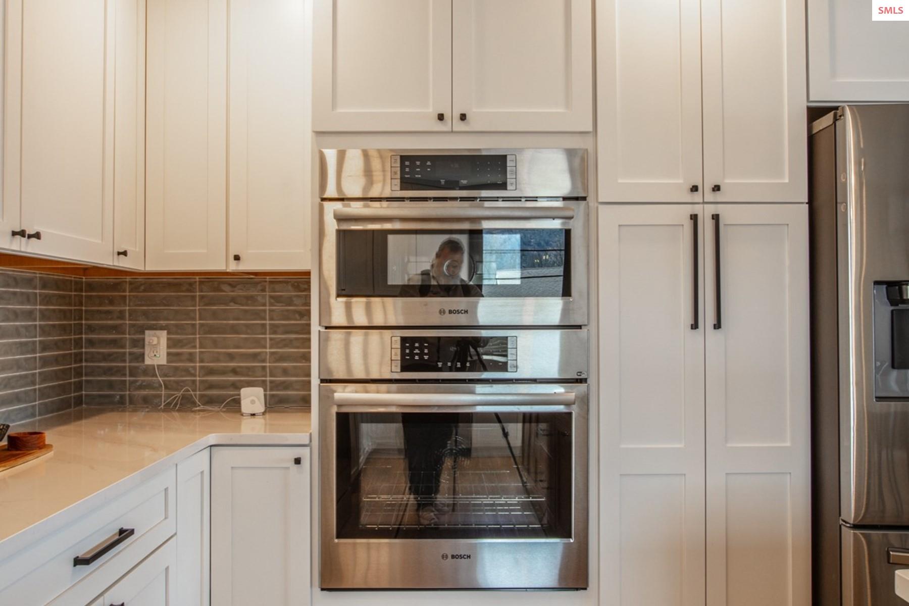 475 Campbell Point Road Laclede, ID 83841 - Photo 15 of 66 Bosch Oven, Microwave, and Range Oven to cook for friends and family. Perfectly placed lighting.