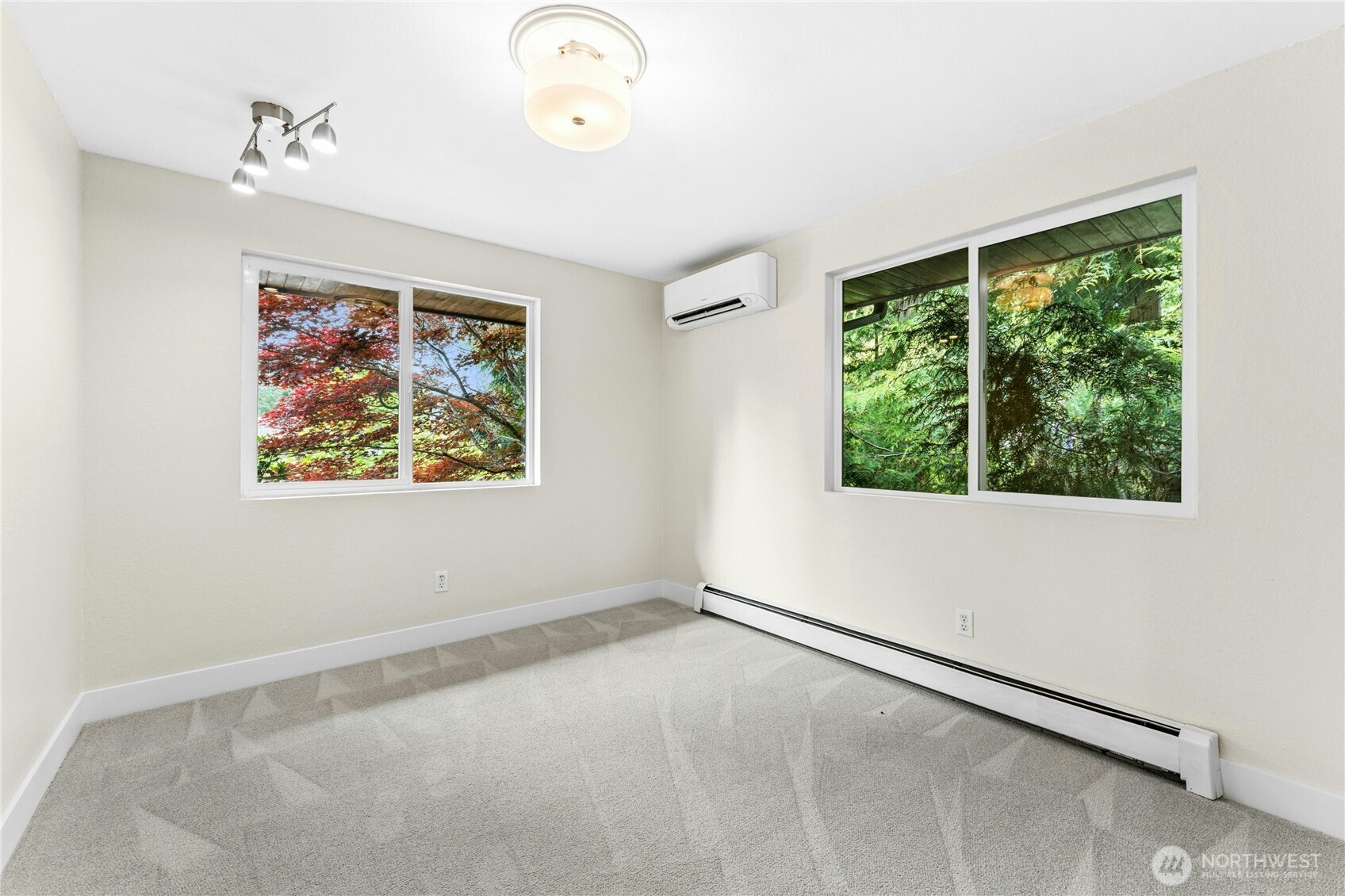 18152 145th Avenue Southeast Renton, WA 98058 - Photo 29 of 40 an empty room with a window