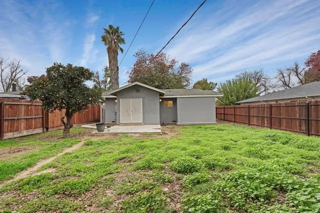 a house view with a garden space