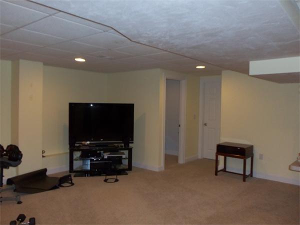 36 Britts Ridge Cumberland, RI 02864 - Photo 17 of 18 a room with furniture and a flat screen tv