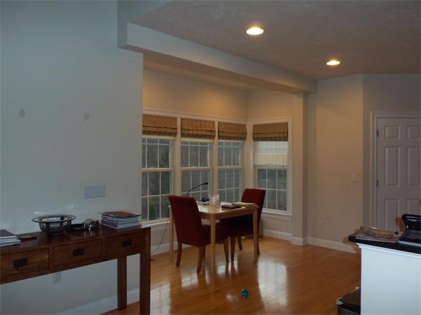 36 Britts Ridge Cumberland, RI 02864 - Photo 4 of 18 a workspace with furniture and wooden floor