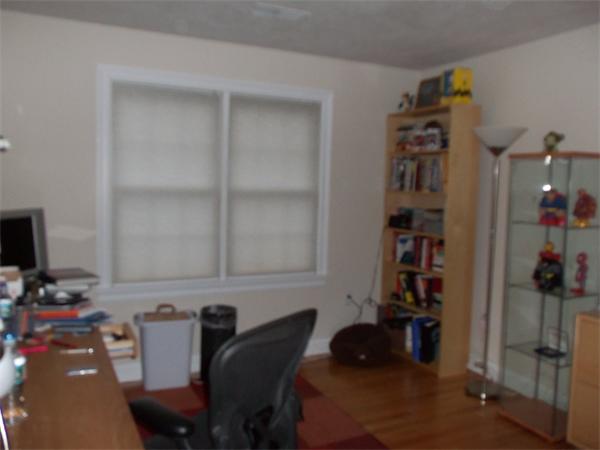 36 Britts Ridge Cumberland, RI 02864 - Photo 7 of 18 a view of a livingroom with workspace and a window