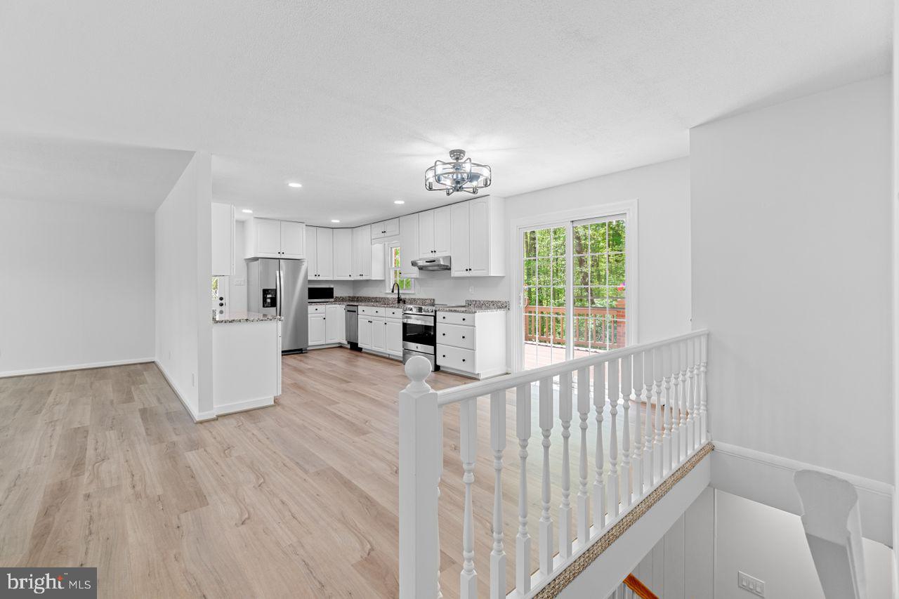 27475 Three Notch Road Mechanicsville, MD 20659 - Photo 14 of 45 Hall looking towards Breakfast Room and Kitchen