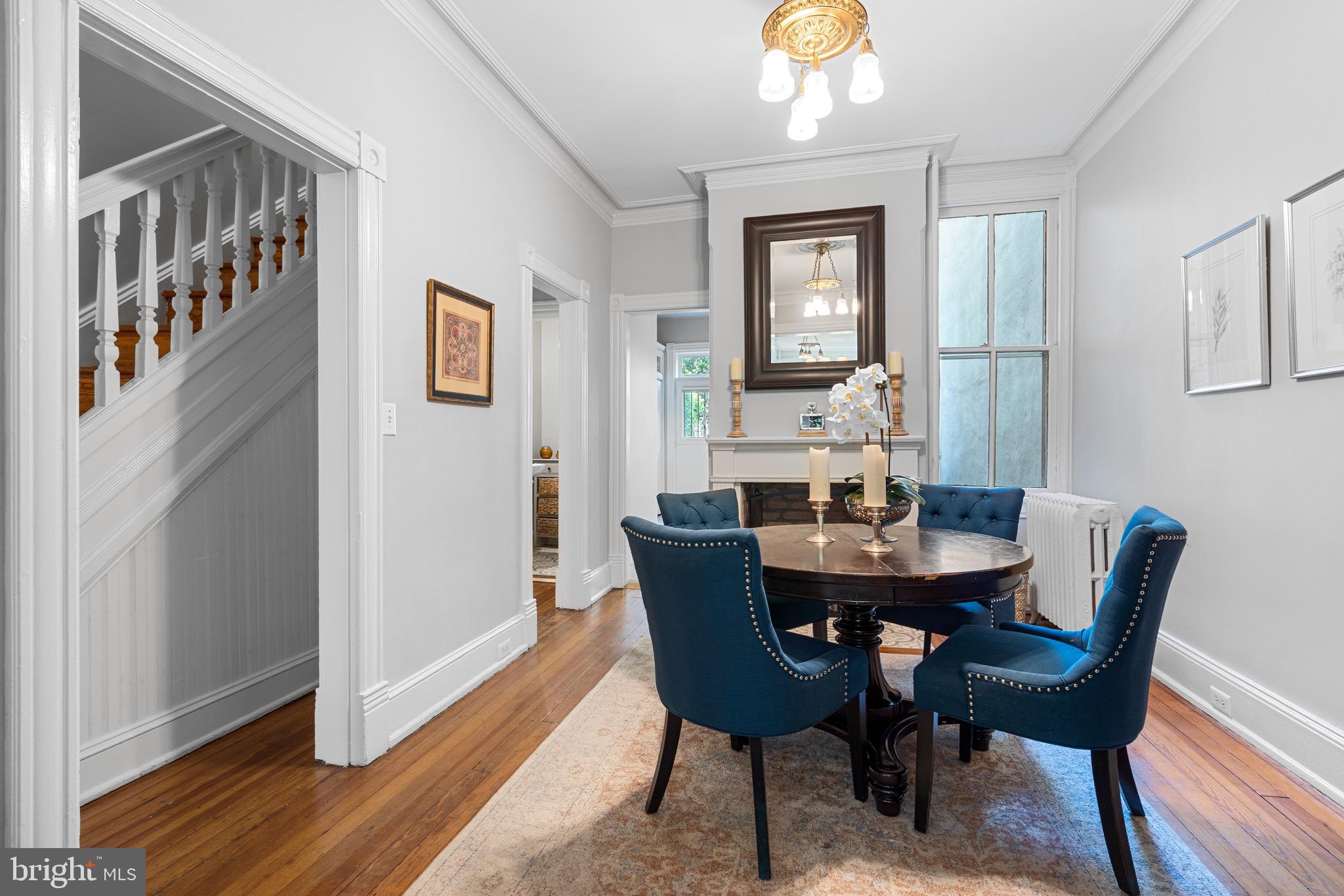 207 10th Street Northeast Washington, DC 20002 - Photo 11 of 40 a view of a dining room with furniture and wooden floor