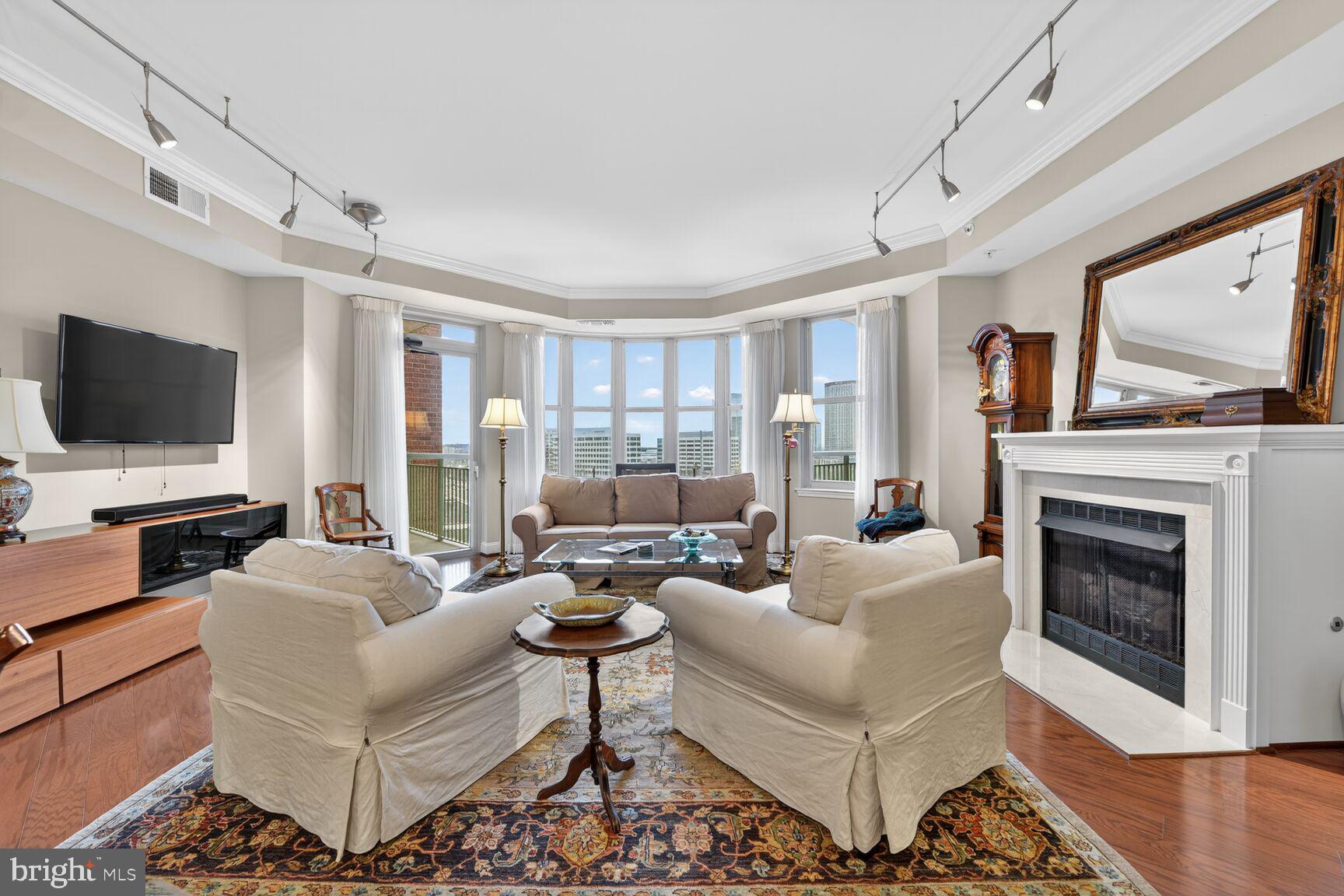 11776 Stratford House Place, Unit 901 Reston, VA 20190 - Photo 2 of 42 Living Room with Balcony