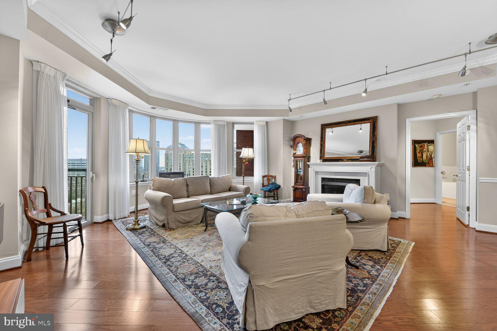 11776 Stratford House Place, Unit 901 Reston, VA 20190 - Photo 8 of 42 Living Room with Balcony
