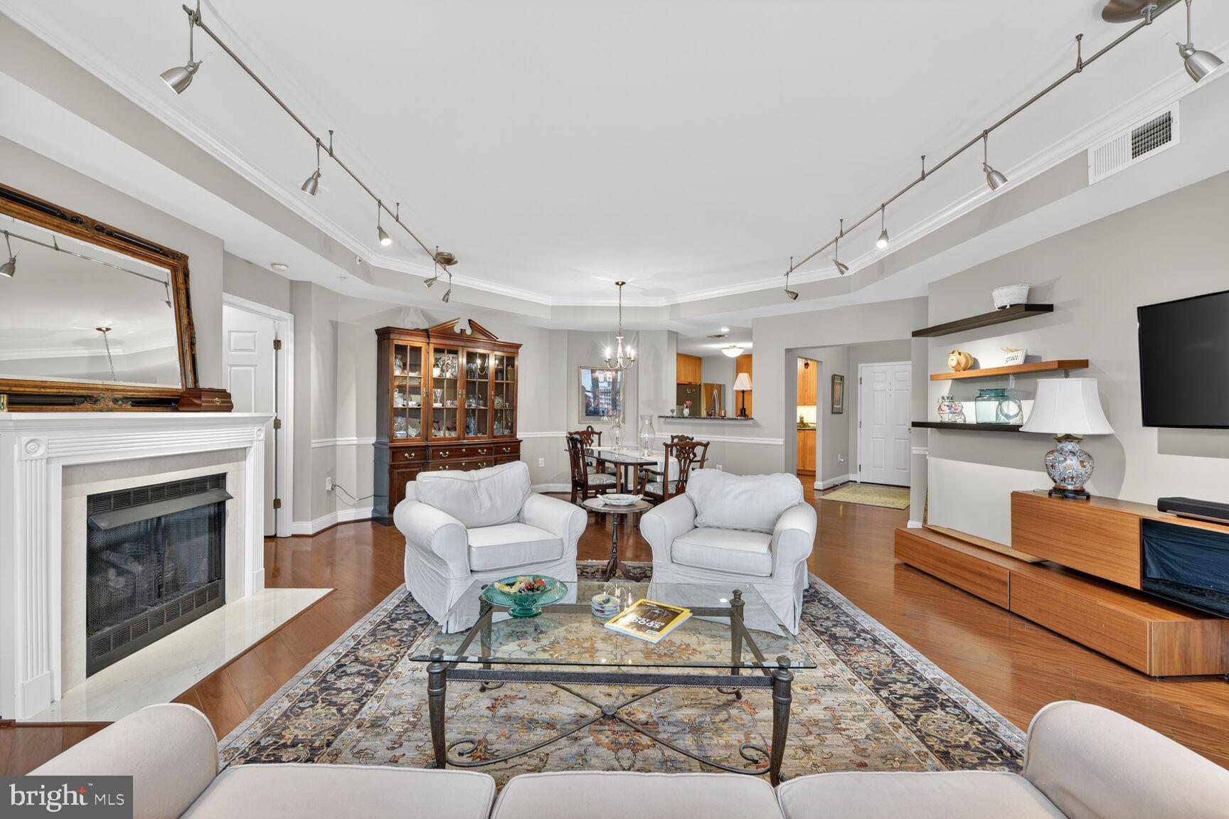 11776 Stratford House Place, Unit 901 Reston, VA 20190 - Photo 9 of 42 Living Room & Dining Room