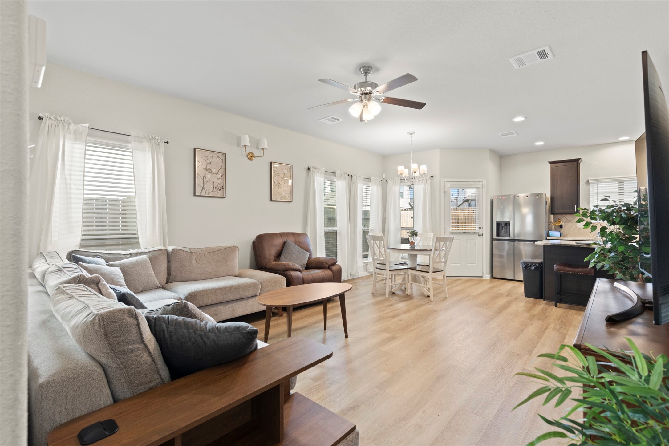 6444 Wenlock Drive Houston, TX 77048 - Photo 6 of 21 a living room with furniture and a large window