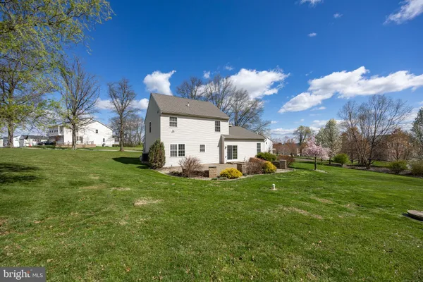a view of a house with a big yard