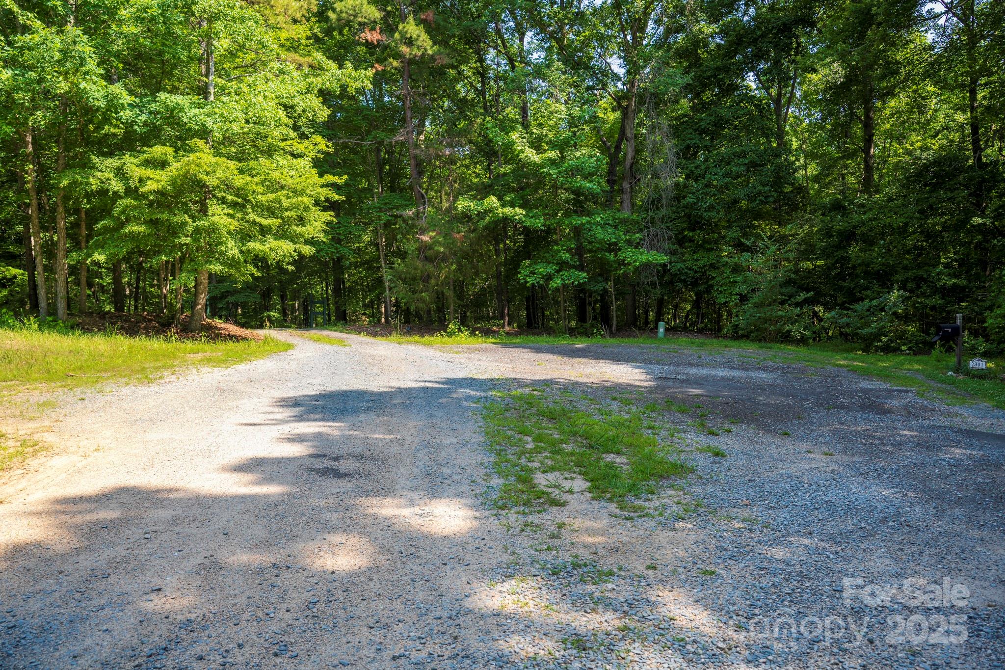 Lot 33 Valley Farm Road, Unit 33 Waxhaw, NC 28173 - Photo 4 of 35 a view of a backyard with green space