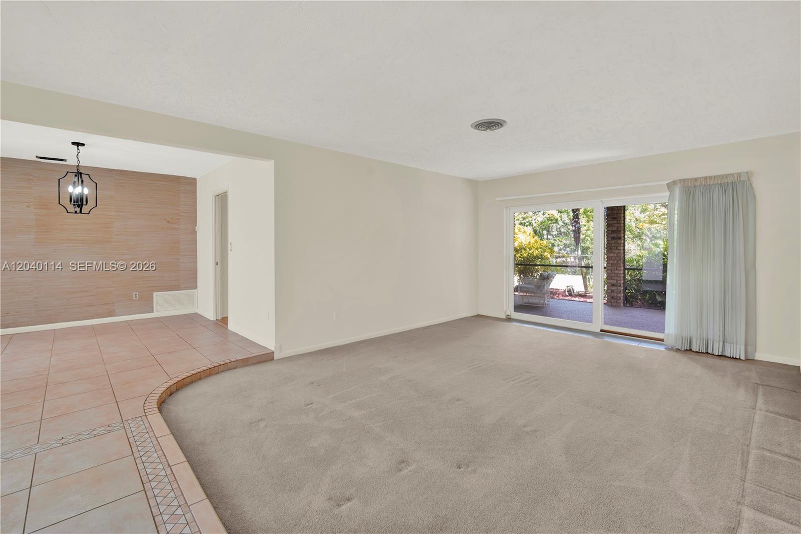 10435 Southwest 96th Street Miami, FL 33176 - Photo 5 of 44 Foyer entry into a 13.8' x 17.4' sunken living room