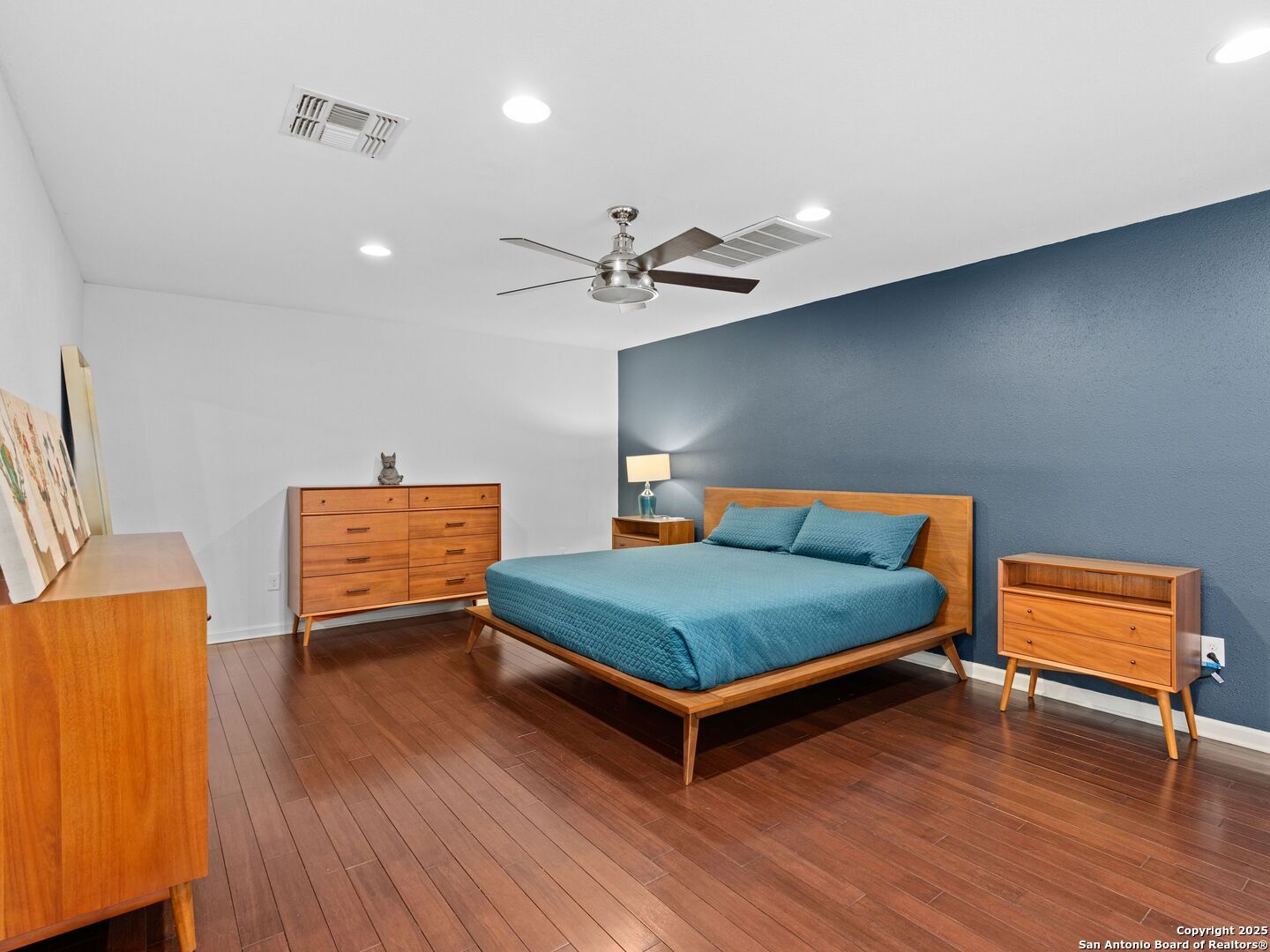 215 Tophill Road San Antonio, TX 78209 - Photo 13 of 29 a bedroom with a bed and window