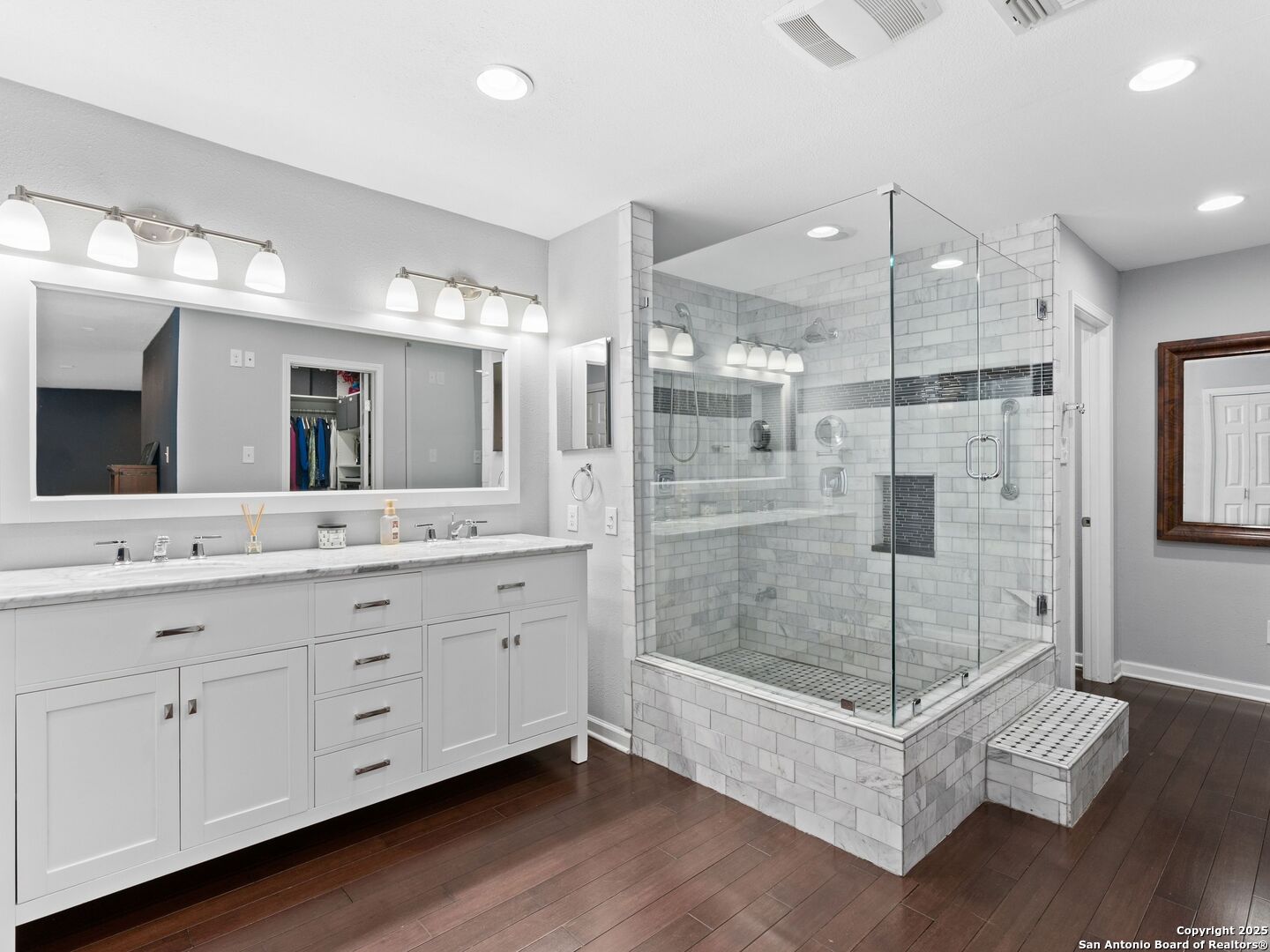 215 Tophill Road San Antonio, TX 78209 - Photo 15 of 29 a bathroom with a double vanity sink mirror and shower