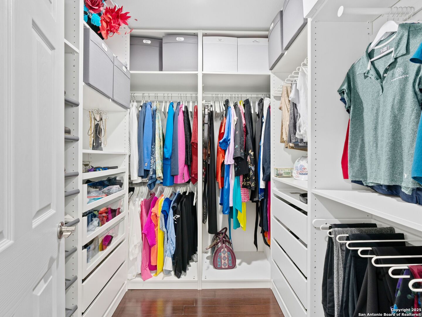 215 Tophill Road San Antonio, TX 78209 - Photo 17 of 29 a view of walk in closet with clothes