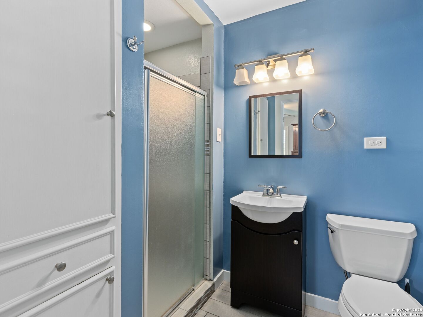 215 Tophill Road San Antonio, TX 78209 - Photo 20 of 29 a bathroom with a sink and a toilet