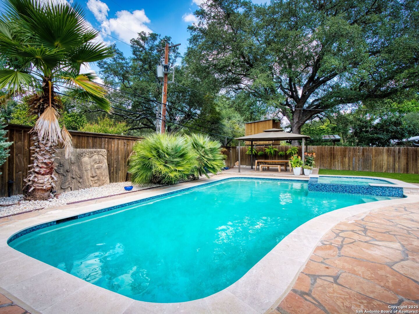 215 Tophill Road San Antonio, TX 78209 - Photo 24 of 29 a view of a swimming pool with a patio