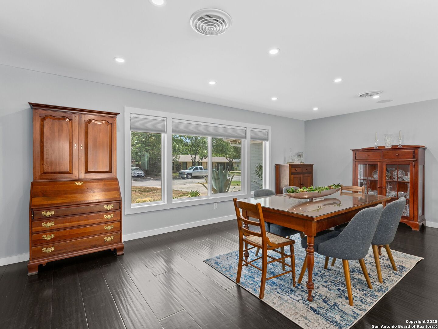 215 Tophill Road San Antonio, TX 78209 - Photo 4 of 29 a view of a workspace with furniture and a window