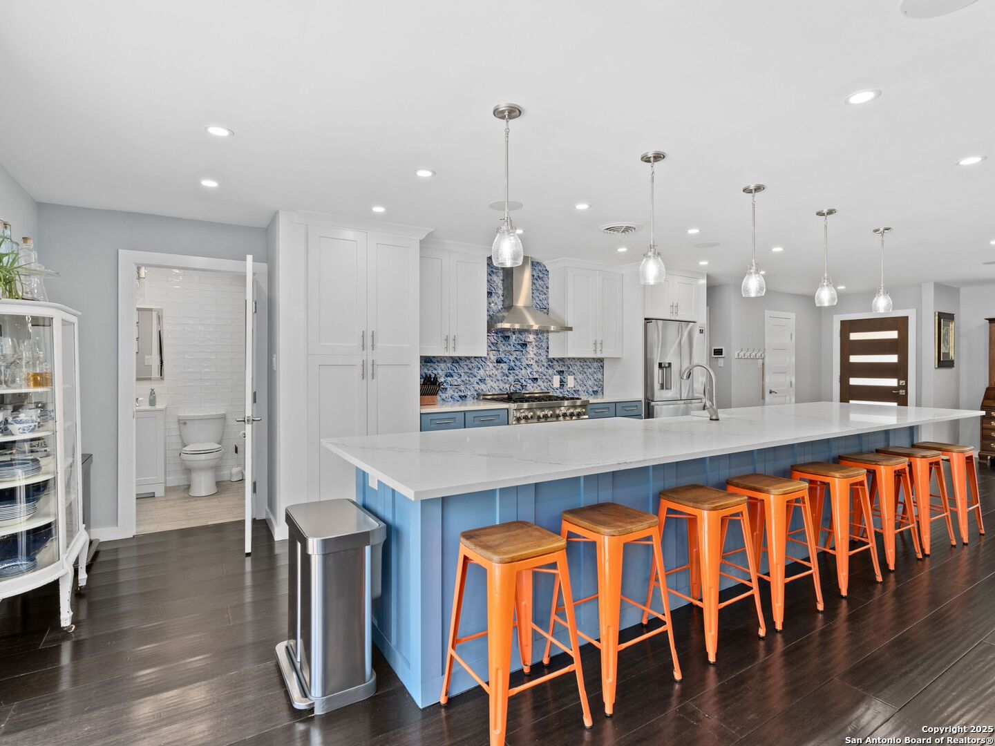 215 Tophill Road San Antonio, TX 78209 - Photo 9 of 29 a large kitchen with a table and chairs