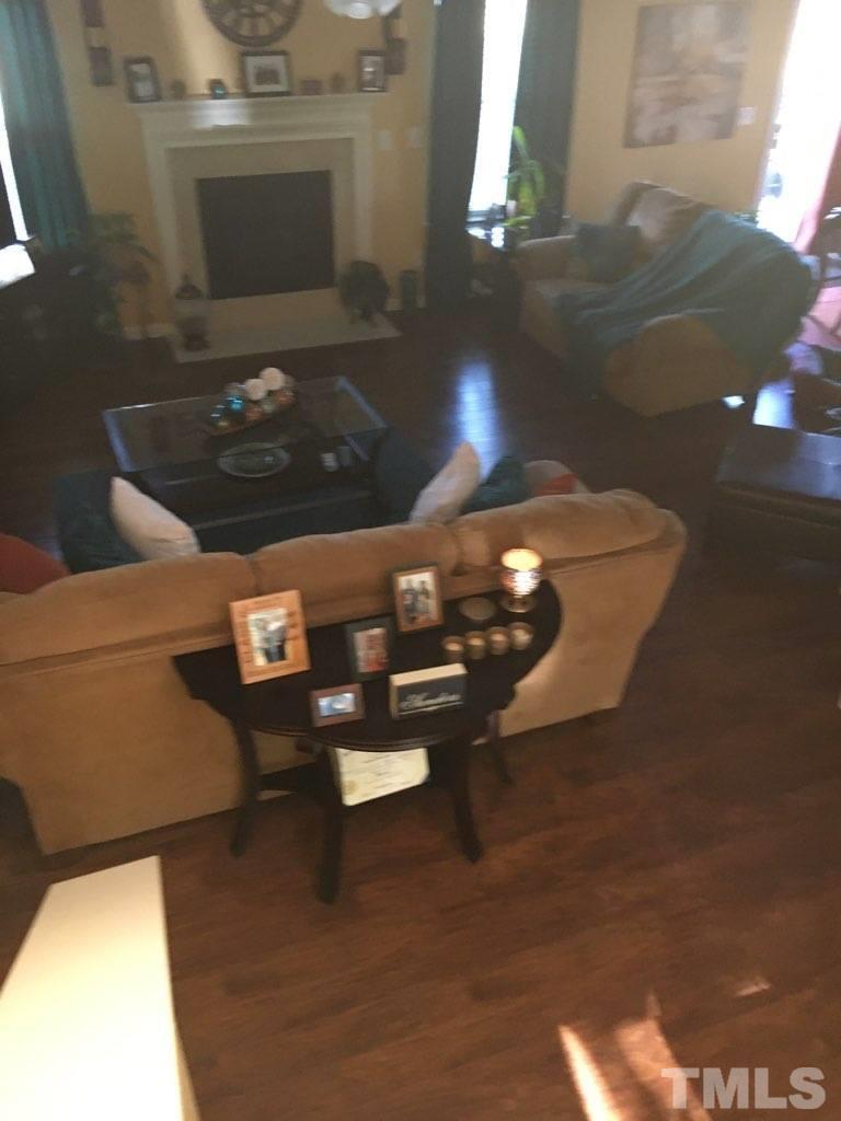 3316 Marshlane Way Raleigh, NC 27610 - Photo 2 of 7 a living room with furniture