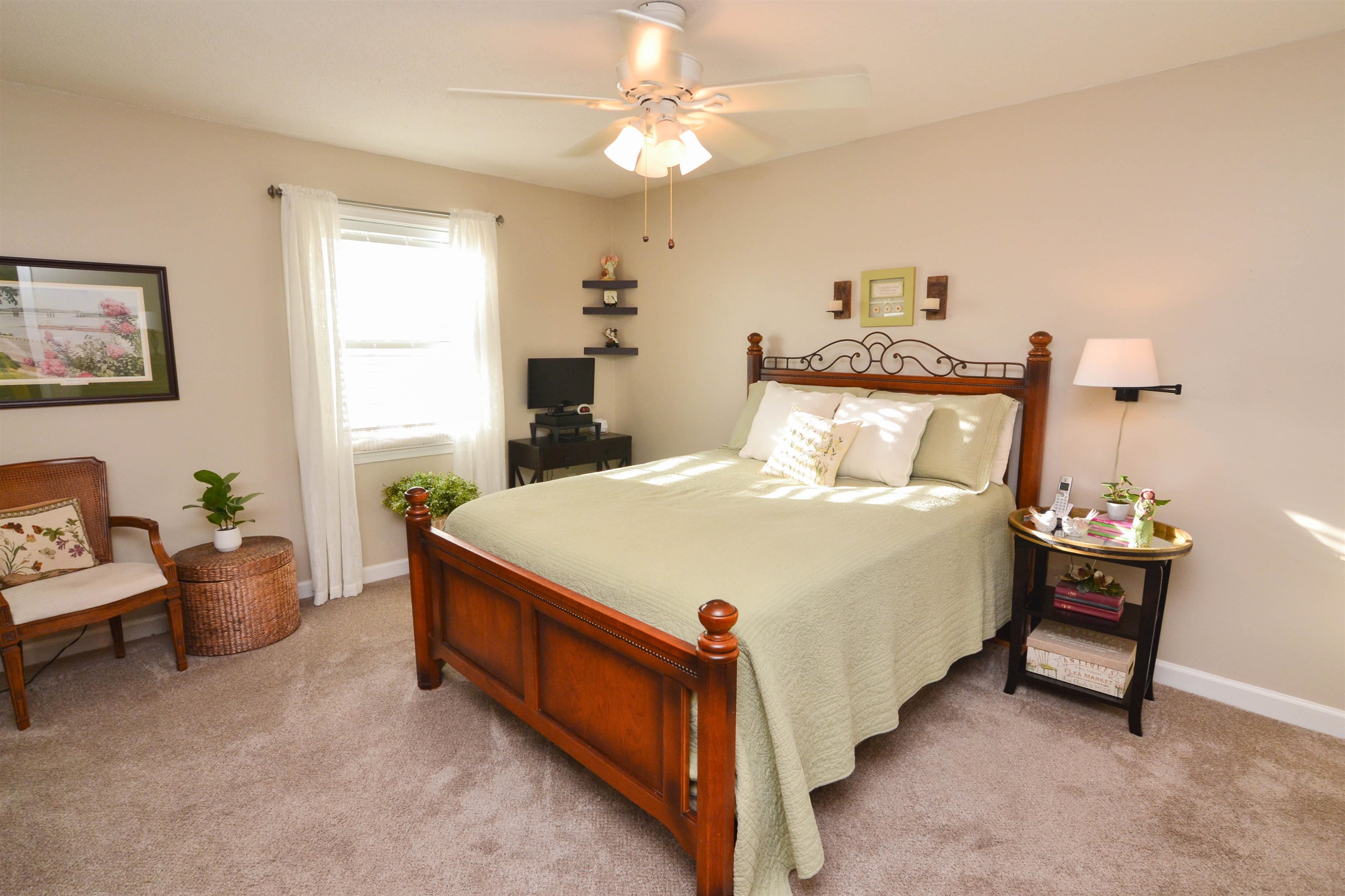 5676 Quince Road, Unit 11 Memphis, TN 38119 - Photo 14 of 22 a bed room with a bed and a chandelier